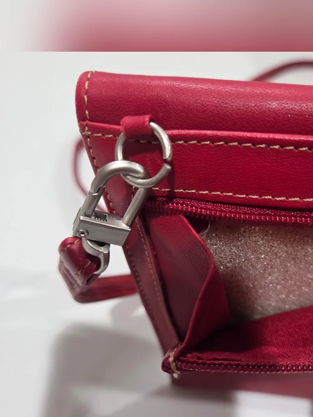 Kenneth Cole Reaction cranberry red crossbody bag
